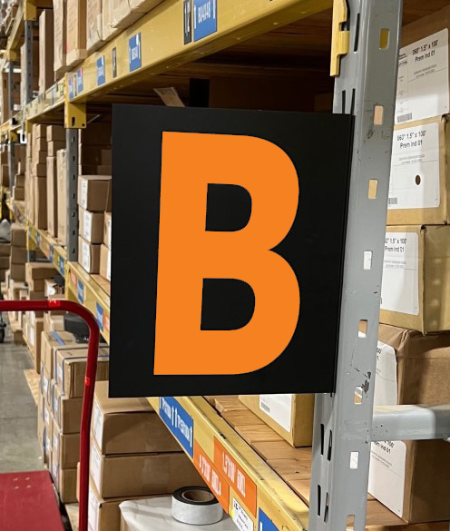 colored warehouse aisle sign with magnetic foot, color lettering