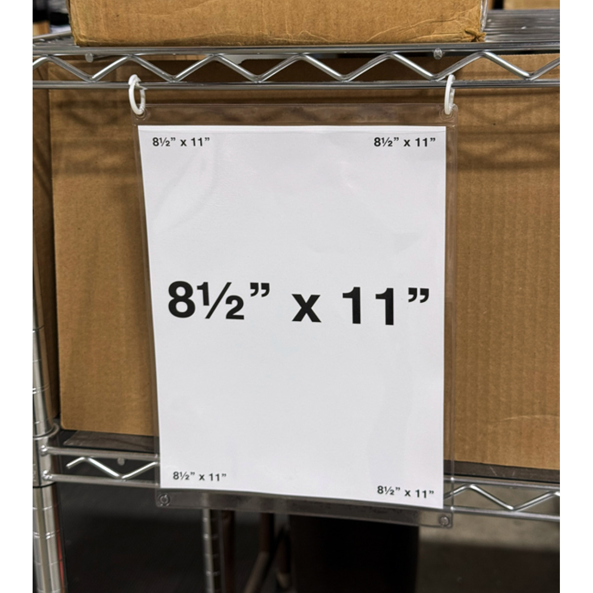 Grommet-style holder on wire rack for warehouse