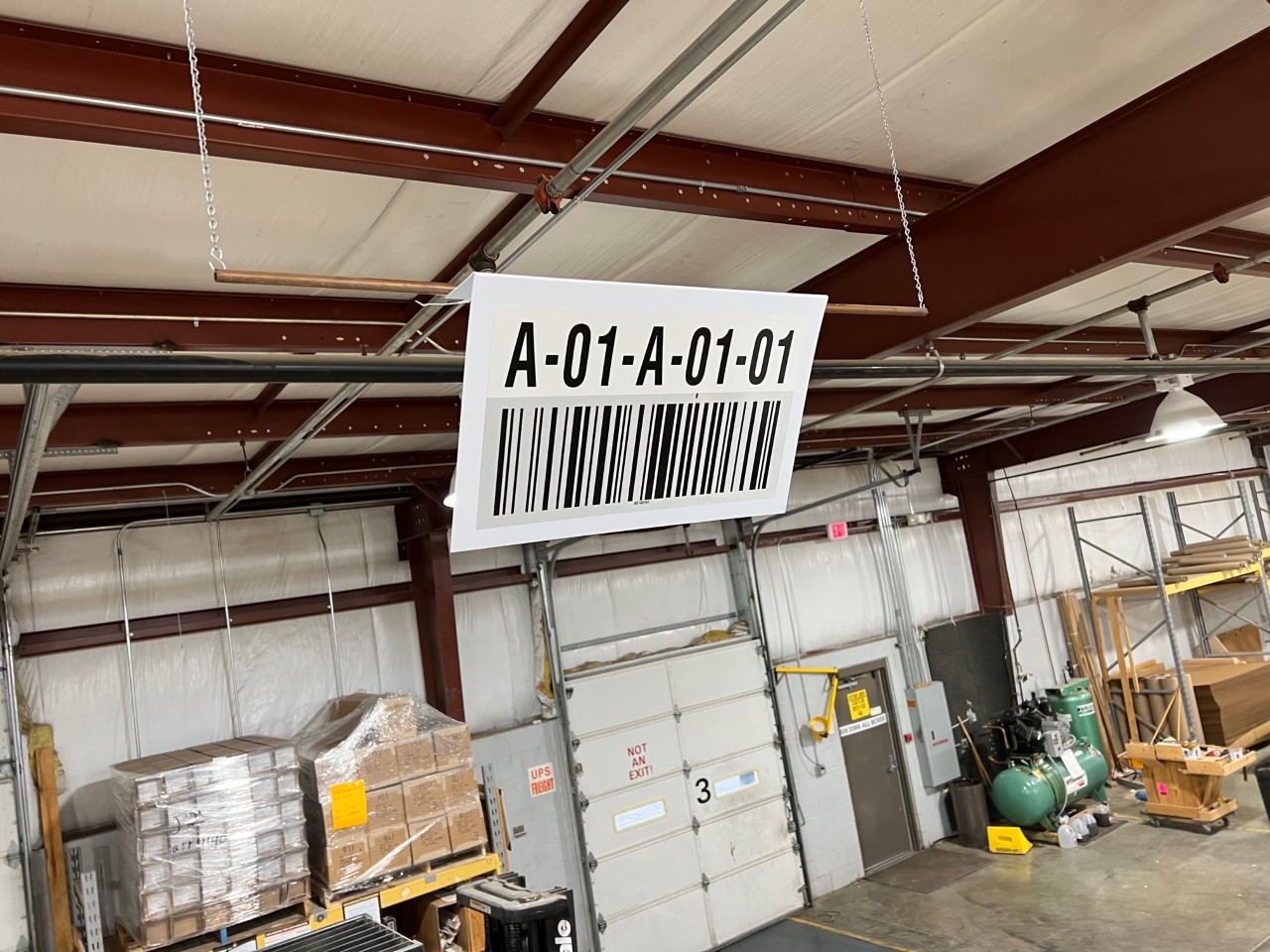 Angled Foot Hanging sign in warehouse
