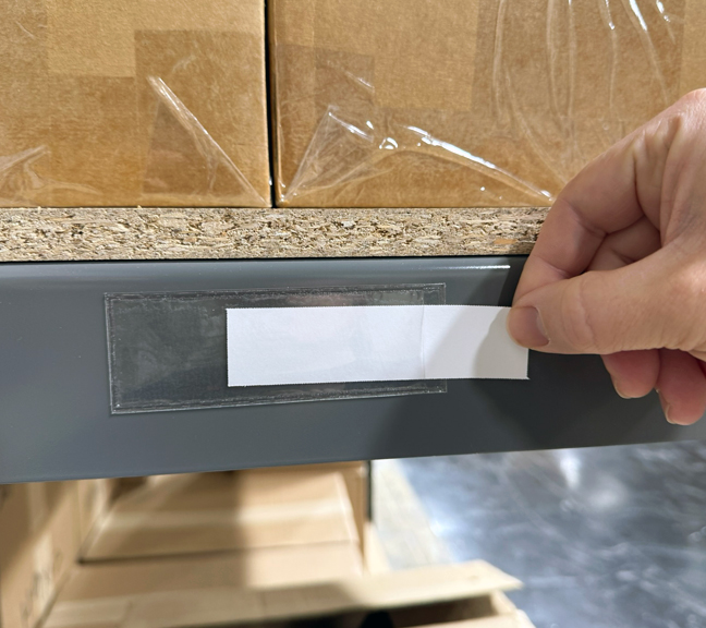 Warehouse pallet rack label holders for product locations