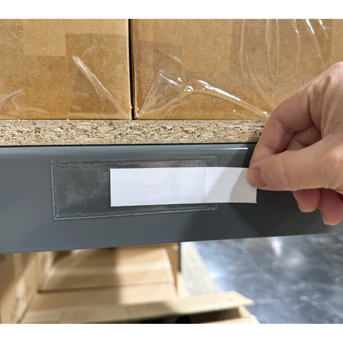 Warehouse pallet rack label holders for product locations