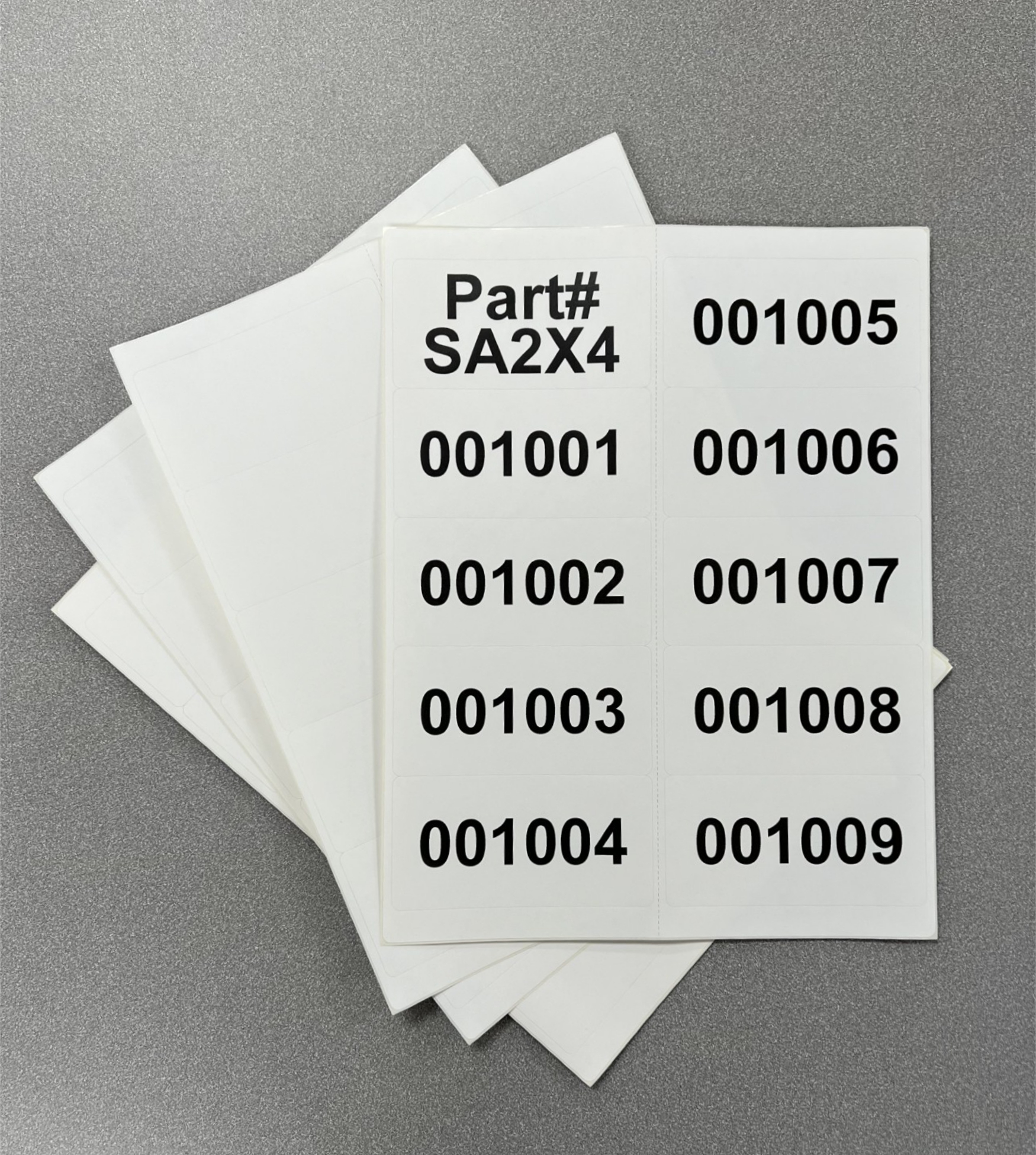 Printed adhesive label sheets