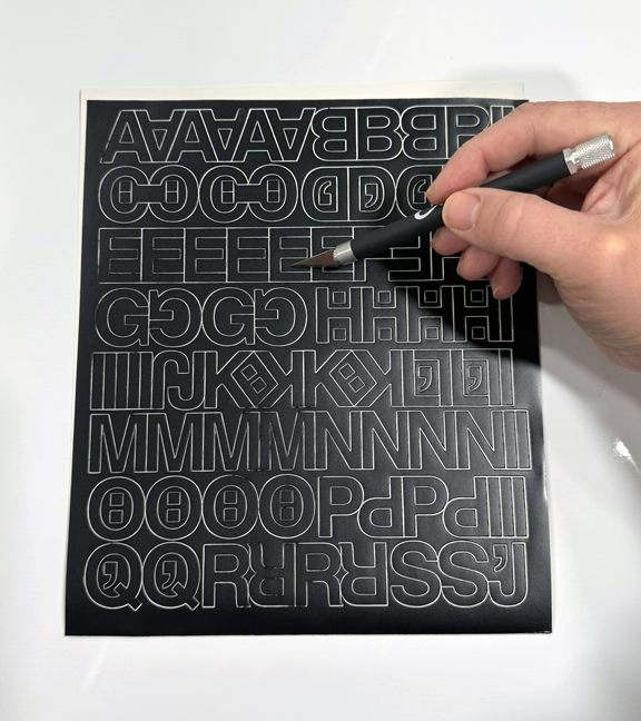 Apply self-adhesive letters and numbers to racks, shelves, bins, totes, doors