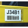 Magnet backed card holder on warehouse rack 