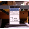 magnetic card holder tag on warehouse shelf lip 