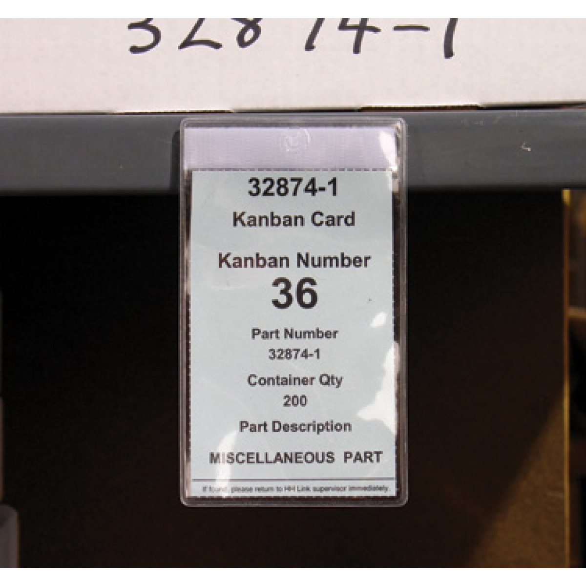 card holder tag on warehouse shelf lip