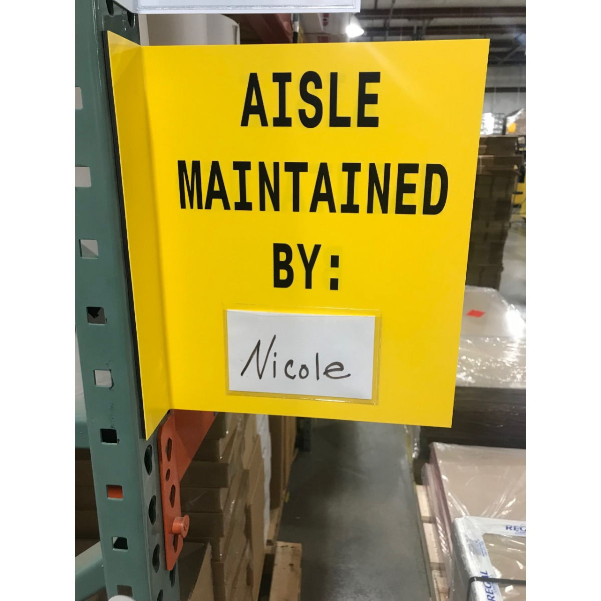 yellow warehouse aisle sign with pouch